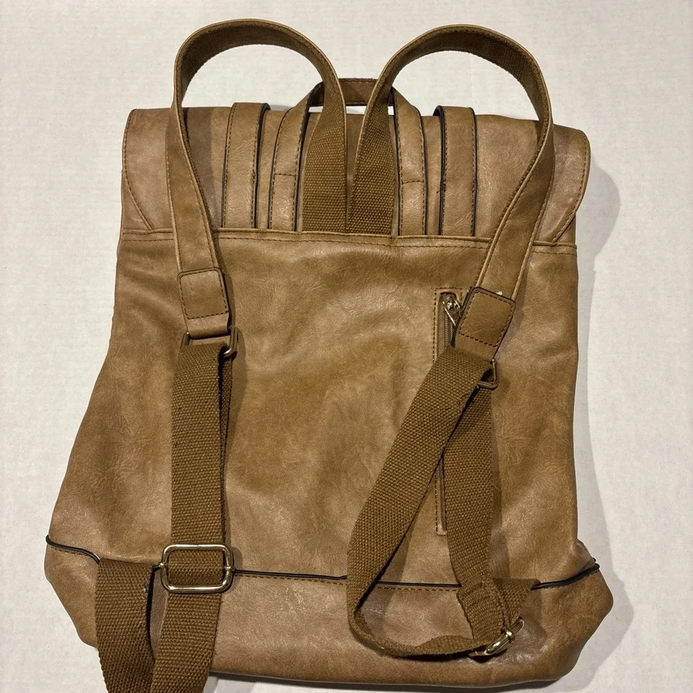 Parker Laser Cut Buckle‎ Fold Over Backpack Vegan Leather in Tan
